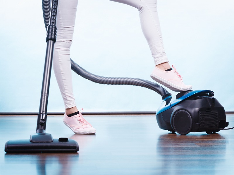 woman-legs-and-vacuum-cleaner-royalty-free-image-945451790-1556543934