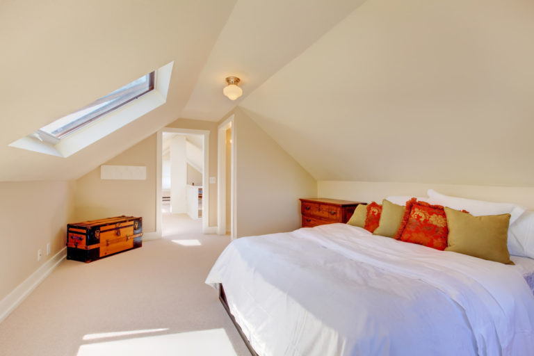 bright-clean-dormer-loft-conversion-bedroom-in-the-decent-size-home-with-beige-carpet